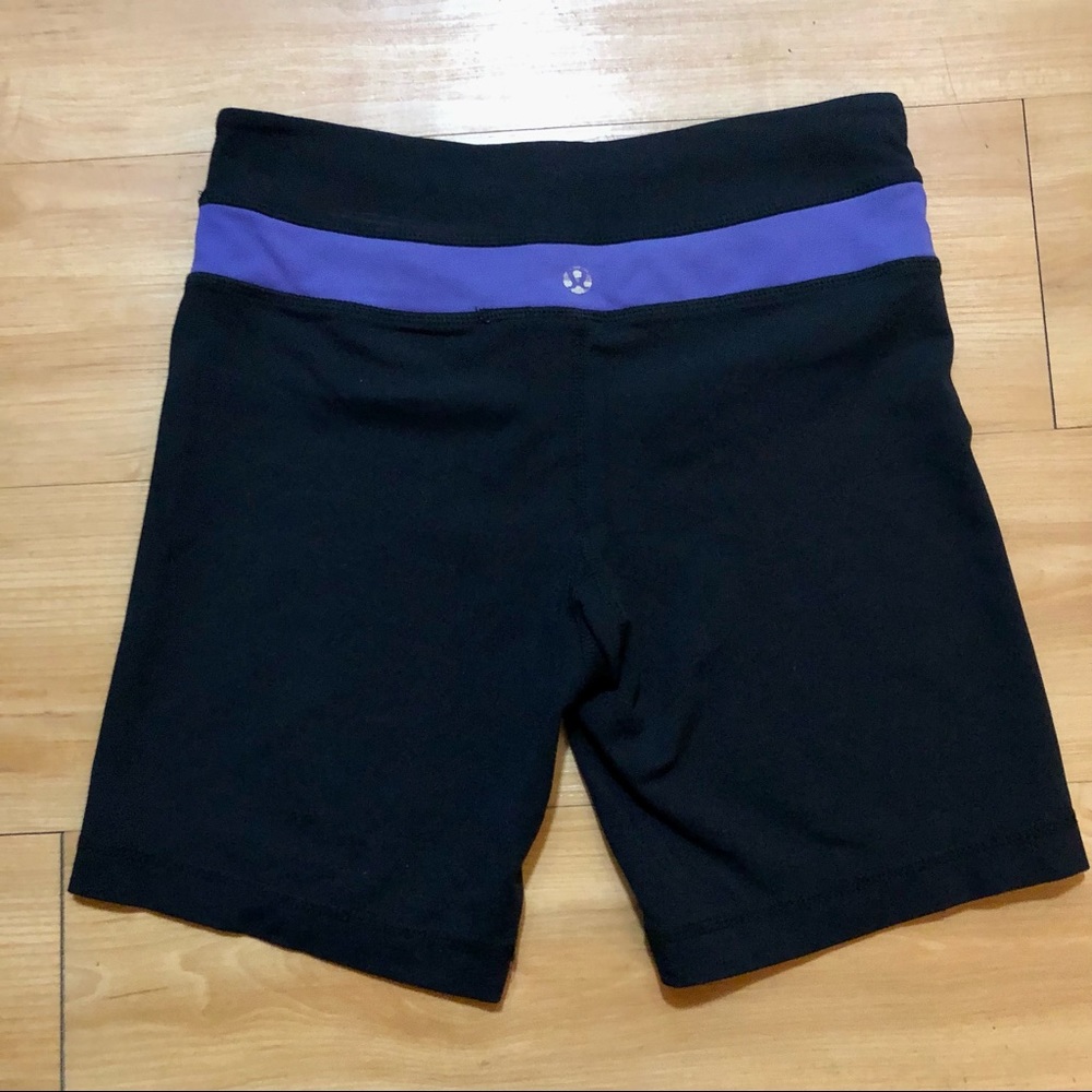 Lululemon Women’s Black with Purple Stripe Bike Athletic Shorts Size 4